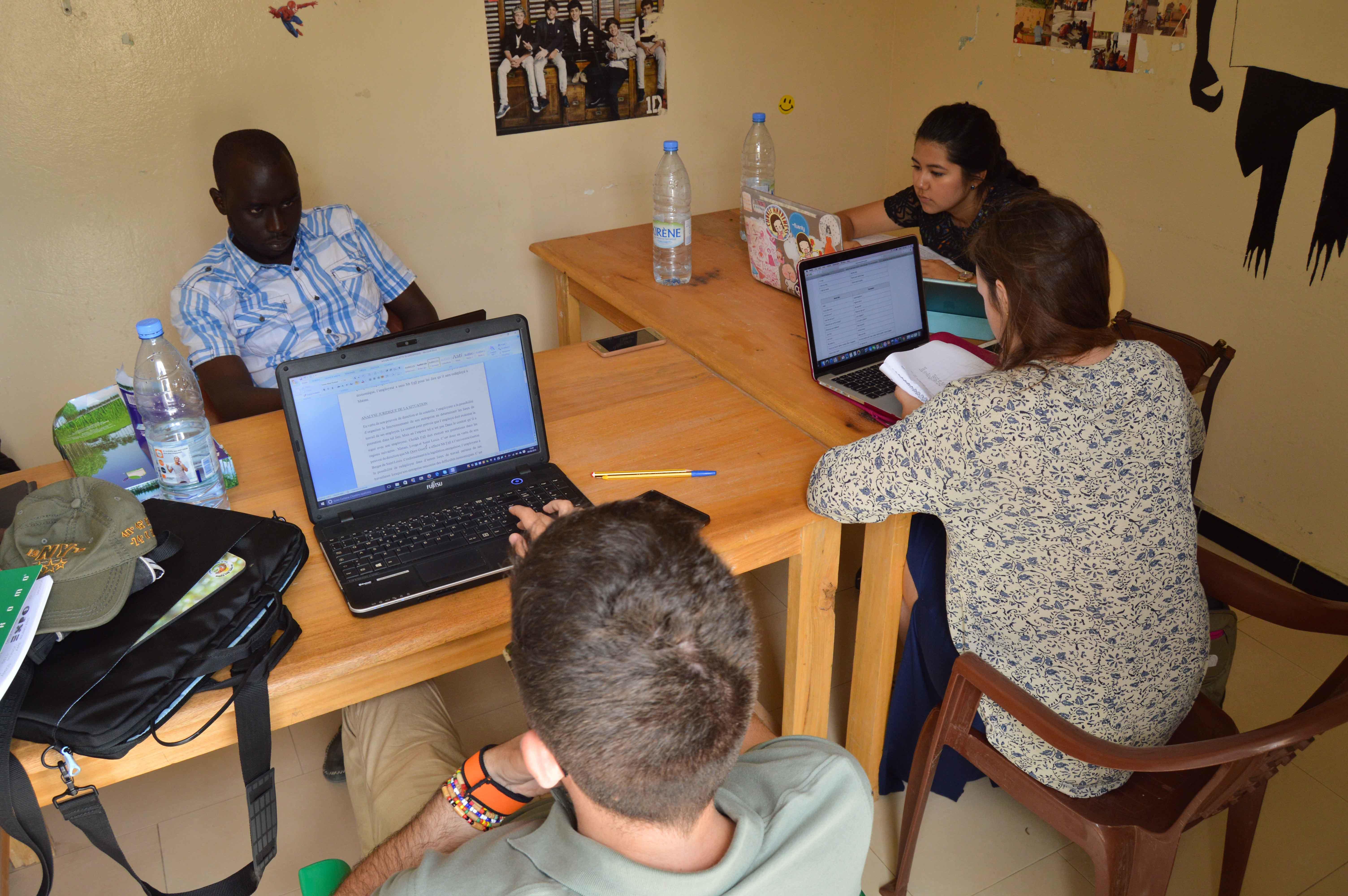 Projects Abroad interns work at their Human Rights placement in Senegal. Students work in the office during their Human Rights internship in Senegal.